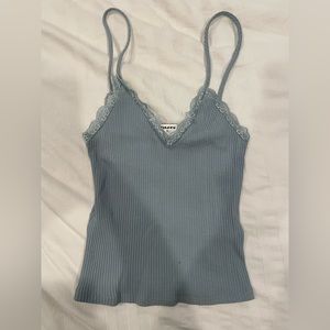 Blue Tilly’s V-neck tank top